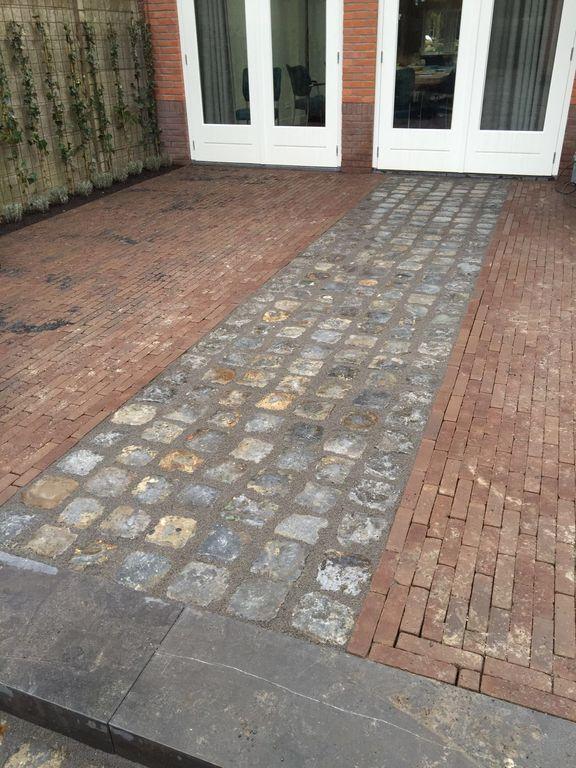porfier kasseien ingewassen met voegmortel